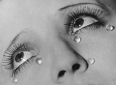 Man Ray photo of eyelash beading