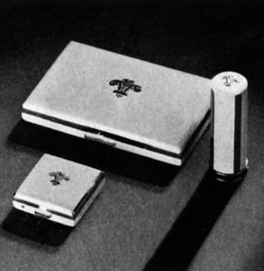 1937 Ivory coloured compacts and lipstick cases