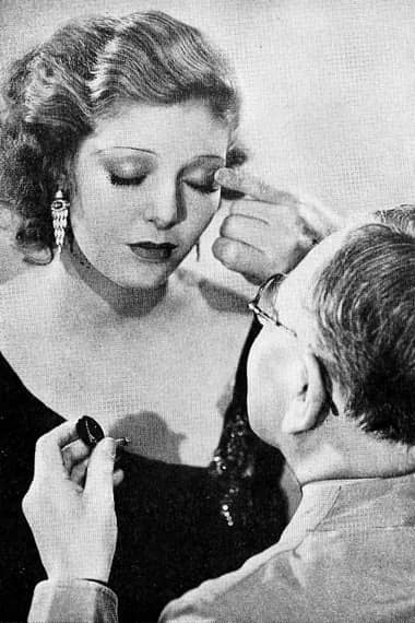 1931 Max Factor applying eye shadow to Loretta Young