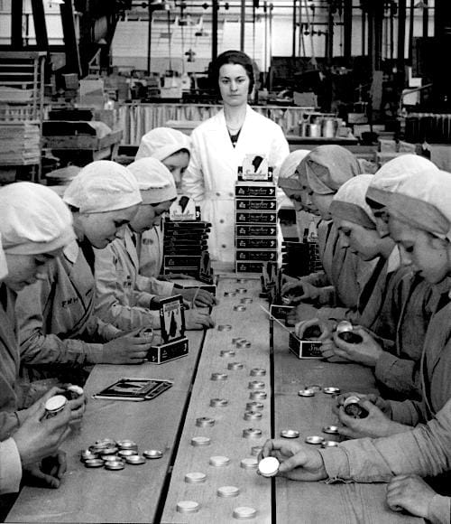 Packing tins of Snowfire Powder Cream