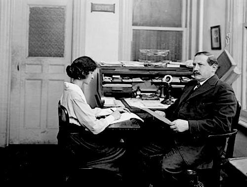 1919 Myram Picker dictating to his secretary