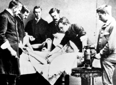 1883 Physicians operating under a germicide spray
